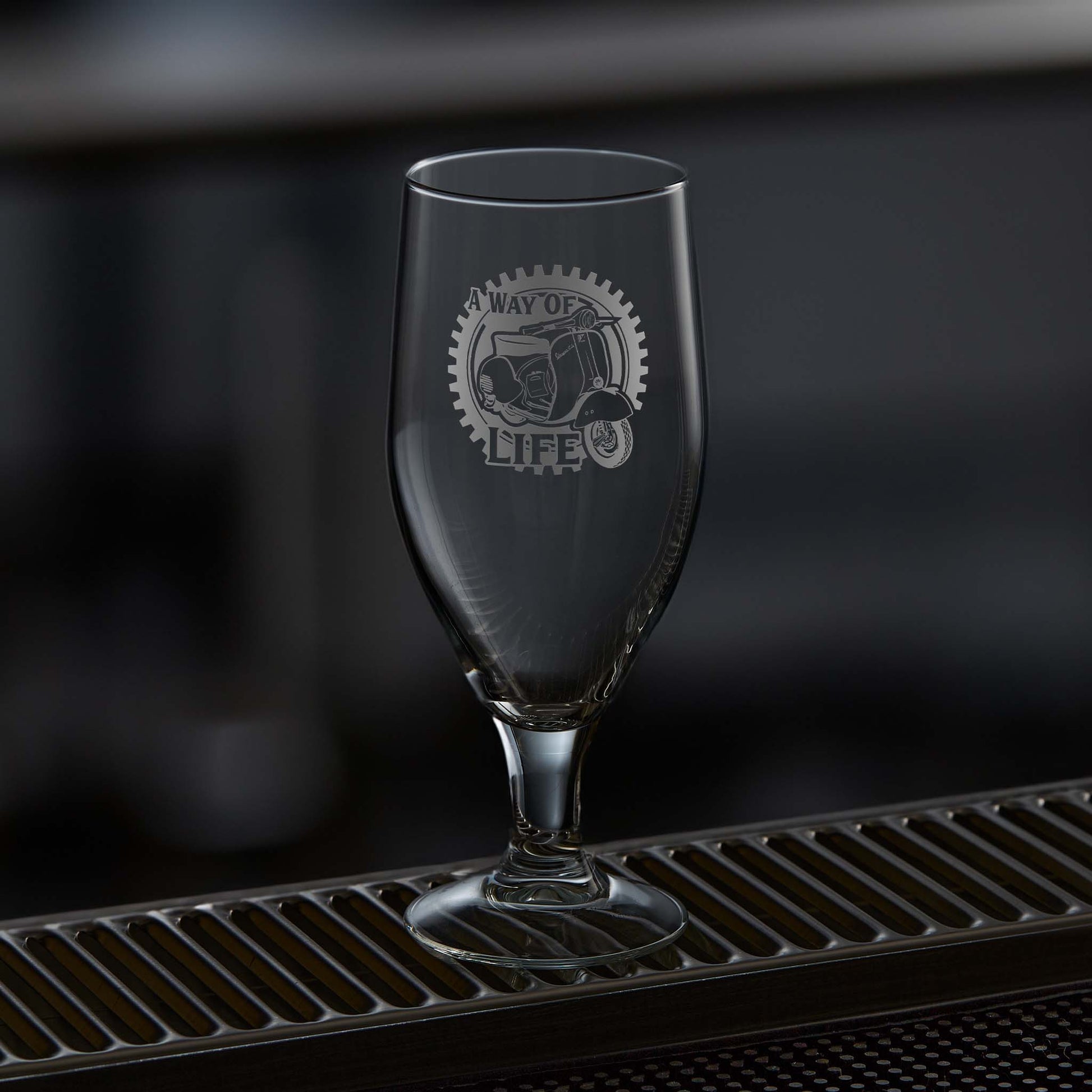 Chalice beer glass engraved with a Vespa GS (gran sport) scooter design