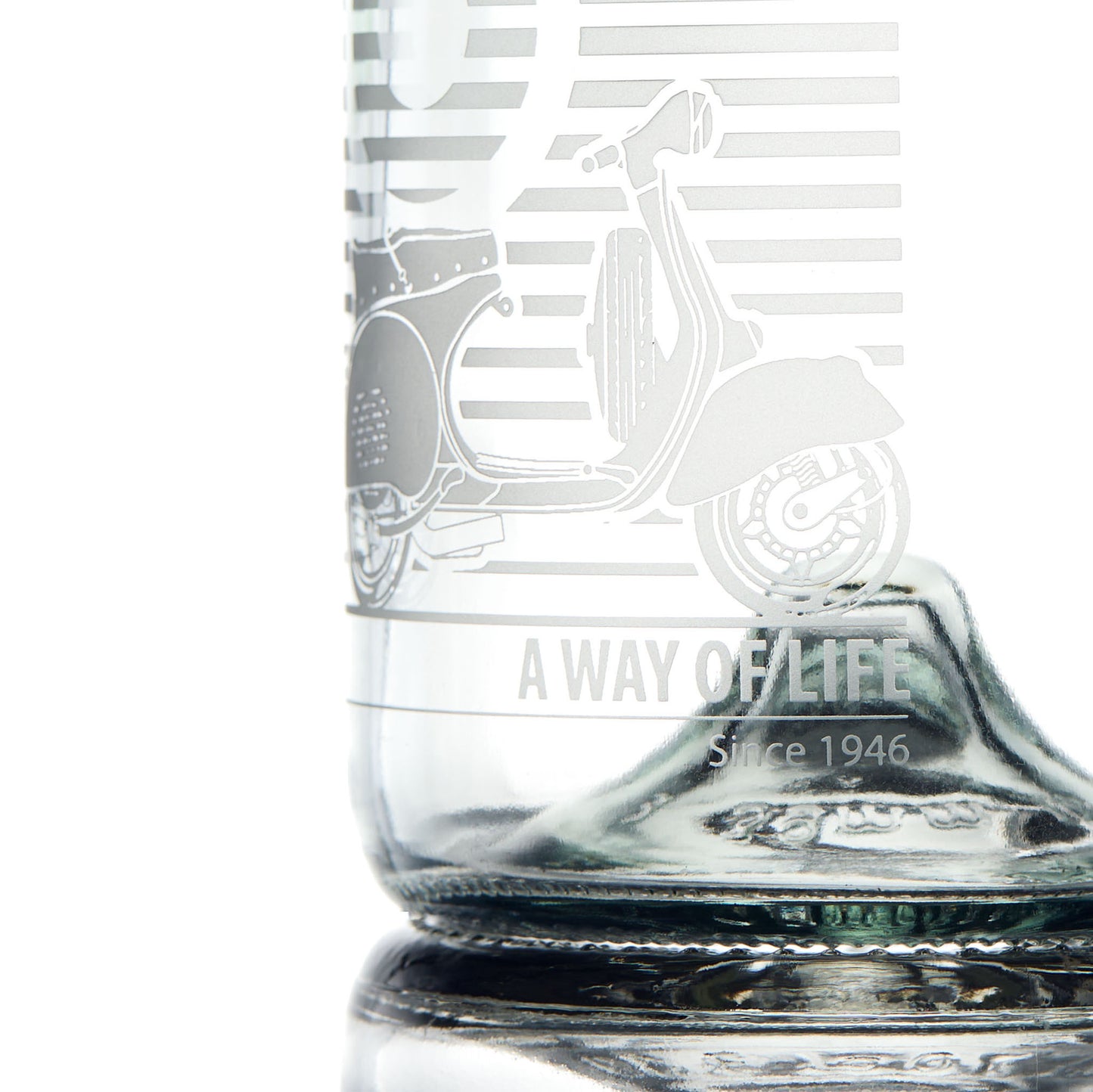 Etched detail of a Vespa decanter engraved with gs150 scooter and mod target with text 