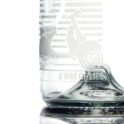 Etched detail of a Vespa decanter engraved with gs150 scooter and mod target with text 