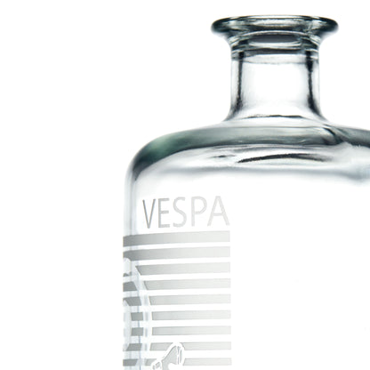 Shoulder detail of a Vespa decanter engraved with gs150 scooter and mod target with text 