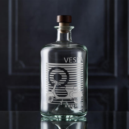 Vespa decanter bottle with wooden cap on a dark background