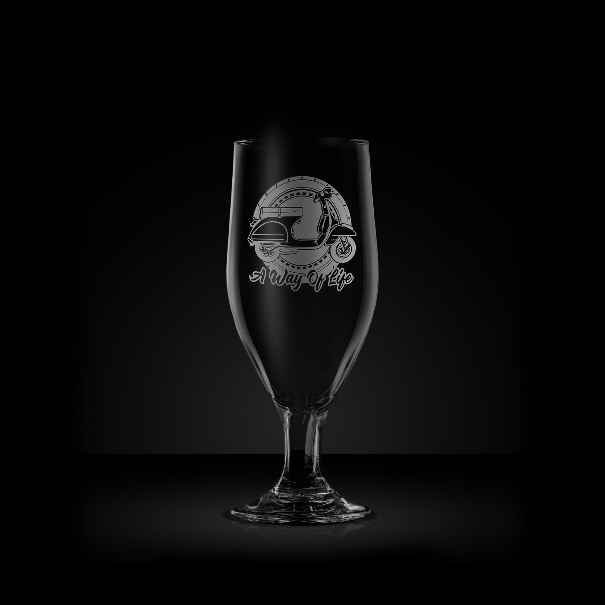 engraved scooter stemmed beer glass featuring a vespa px design