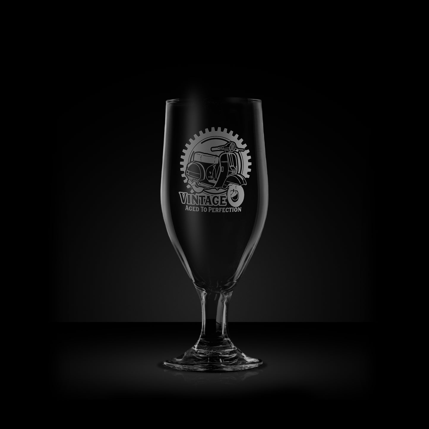 engraved scooter stemmed beer glass featuring a vespa px design