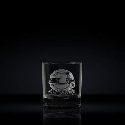 Engraved whisky glass etched with a vespa px scooter