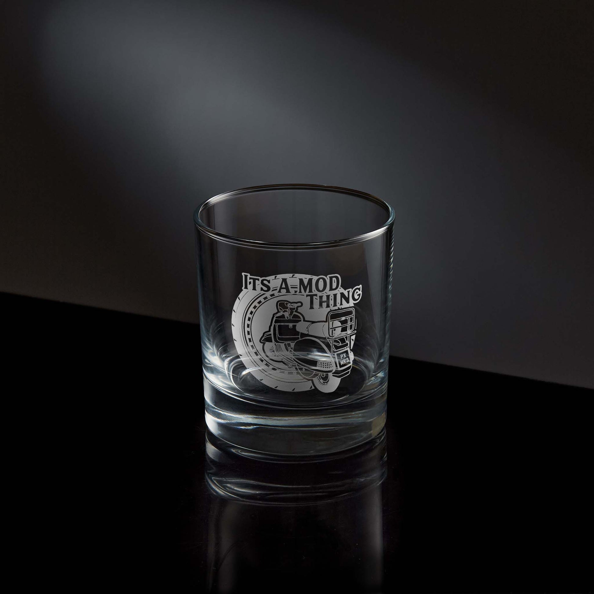 Engraved whisky glass etched with a vespa px scooter