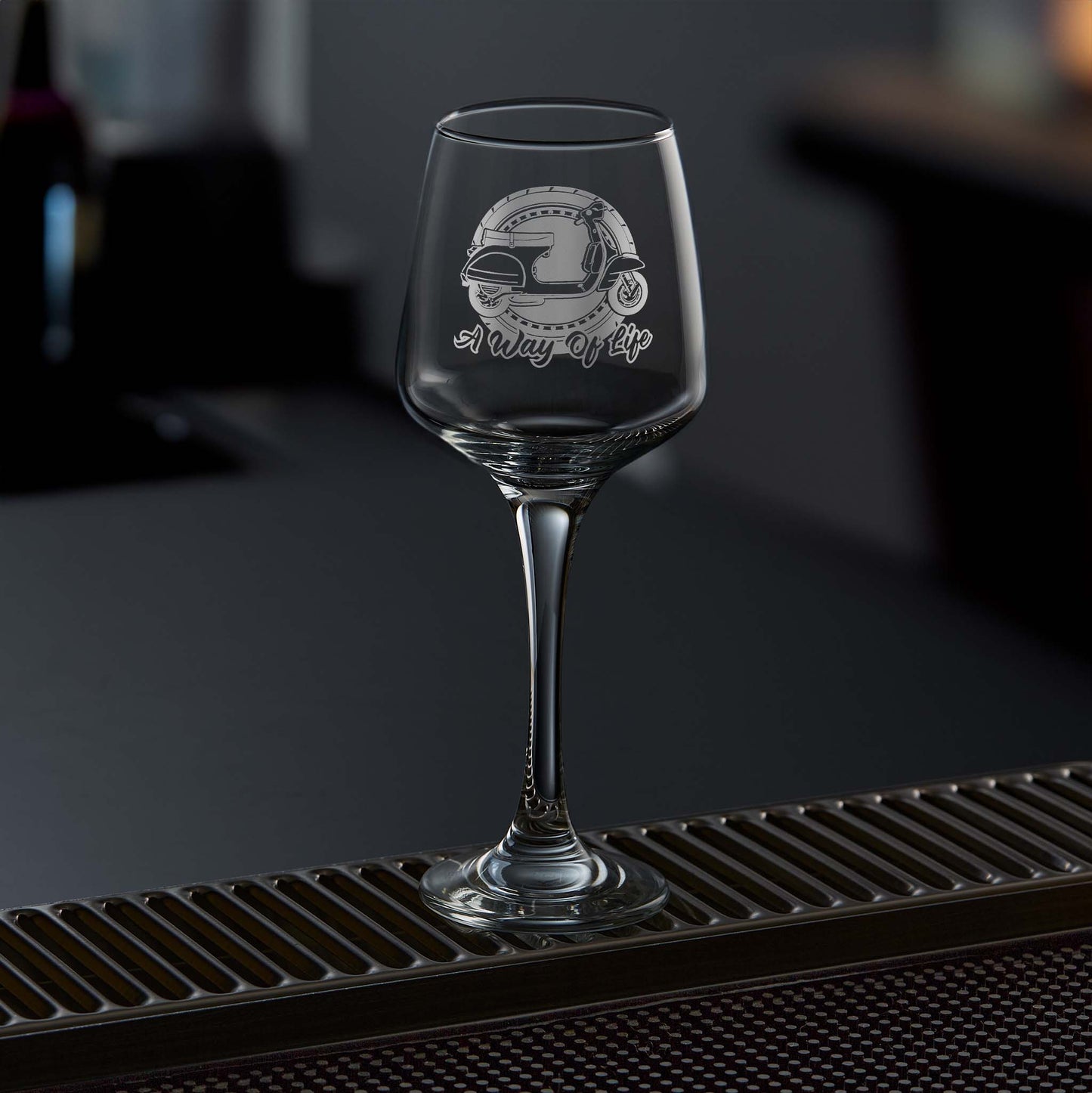 clear wine glass engraved with an italian vespa scooter which can be personalised