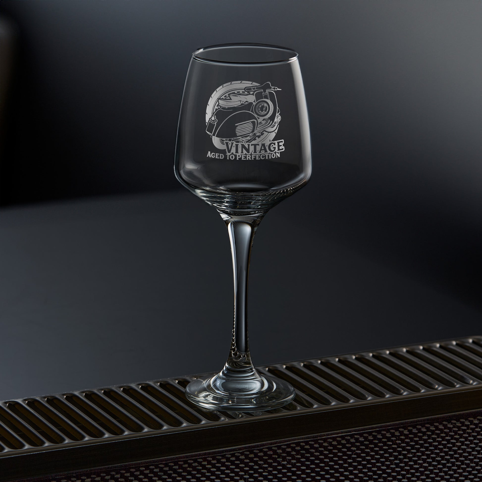 engraved wine glass featuring a vespa GL scooter