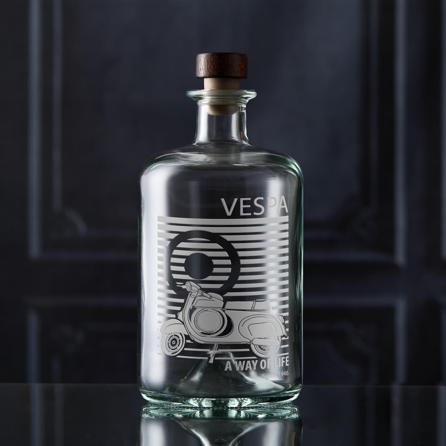 Decanter featureing a detailed engraving of the iconic Vespa SS90
