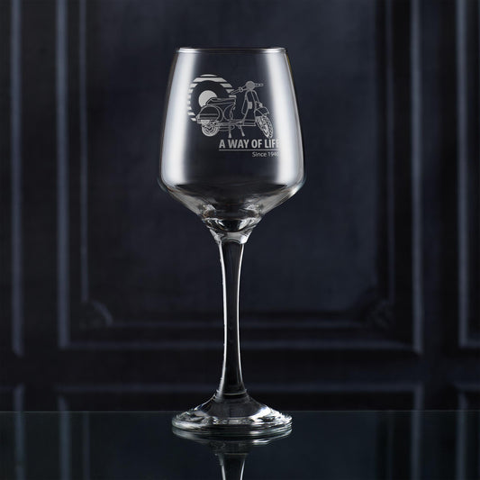 Signature wine glass with Vespa T5 design and Mod target, styled against neutral lifestyle backdrop