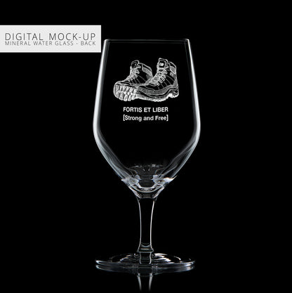Mock-up illustration of a mineral water glass with engraved walking boots design and latin text on a black background
