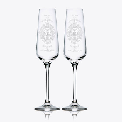 two wedding champagne flutes with engraved lace design, brides names and dates 