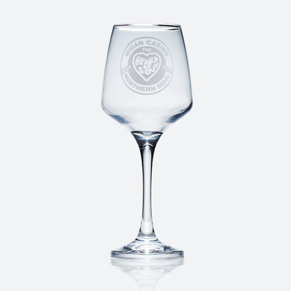 stemmed wine glass engraved with a Wigan Casino badge design