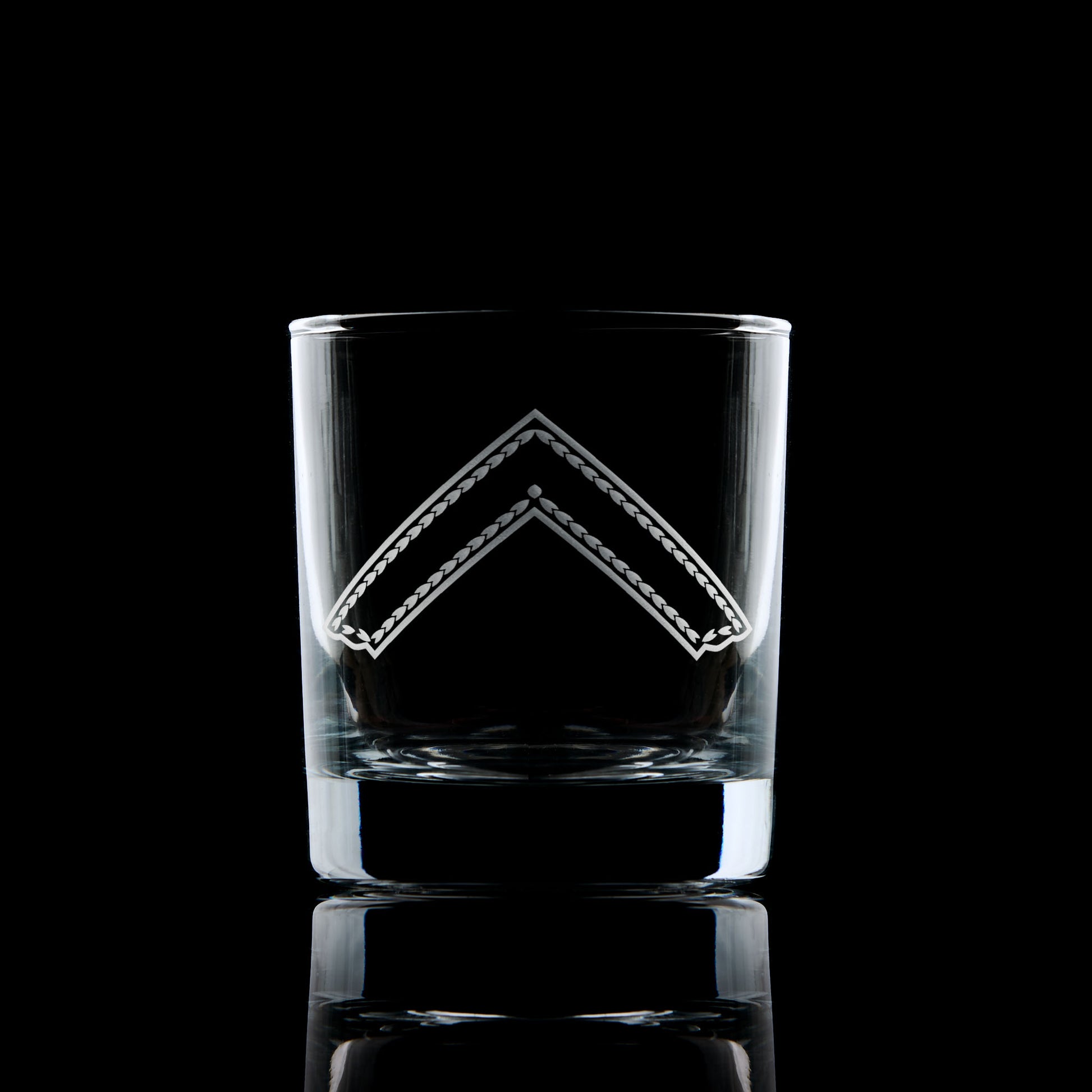 Engraved Worshipful Master whisky glass with collar jewel on black background
