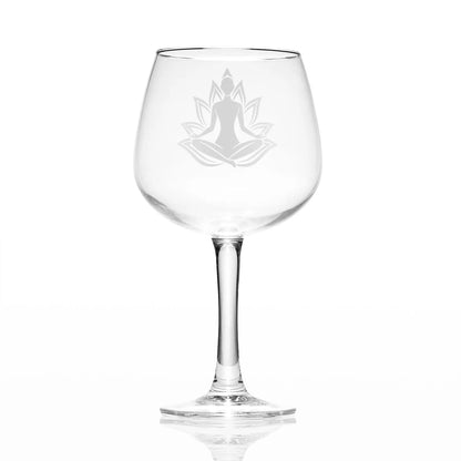 Gin glass engraved with a seated female yoga figure in Sukhasana pose, with optional personalisation, handcrafted in Scotland