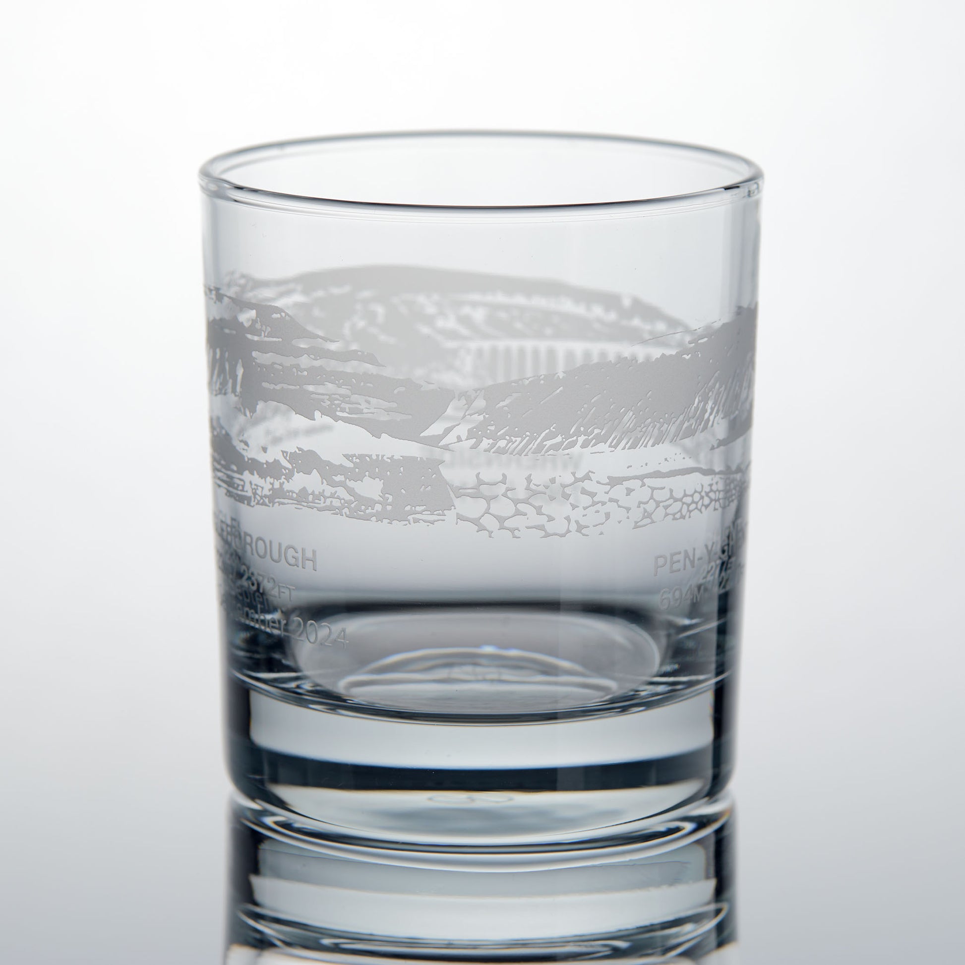 Yorkshire Three Peaks Challenge whisky glass with engraved illustration of Ingleborough and Pen Y Ghent